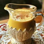 - 1 cup heavy cream - 1 cup whole milk - 1/2 cup canned pumpkin puree The main ingredients are simple and easy to find. Heavy cream gives the creamer a rich texture. Whole milk keeps it smooth and balanced. Canned pumpkin puree adds that classic fall flavor. - 1/4 cup maple syrup - 1 teaspoon pure vanilla extract - 1 teaspoon cinnamon - 1/4 teaspoon nutmeg - 1/4 teaspoon ginger Next, we add flavorings to make it special. Maple syrup adds sweetness without being too strong. Pure vanilla extract gives a warm, inviting note. The spices—cinnamon, nutmeg, and ginger—bring that cozy pumpkin spice taste. - Sweeteners - Flavor extracts - Dairy alternatives You can personalize your creamer. Try different sweeteners, like honey or stevia. Flavor extracts, like almond or hazelnut, can add a twist. If you want a dairy-free option, use almond milk or coconut cream instead. To start, gather your ingredients. In a medium saucepan, combine the following: - 1 cup heavy cream - 1 cup whole milk - 1/2 cup canned pumpkin puree Place the saucepan over medium heat. Stir the mixture gently. Watch for it to become warm and smooth. Avoid letting it boil. This step creates a creamy base for your coffee creamer. Next, it’s time to add some sweetness and spice. Once your base is warm, add these ingredients: - 1/4 cup maple syrup - 1 teaspoon pure vanilla extract - 1 teaspoon cinnamon - 1/4 teaspoon nutmeg - 1/4 teaspoon ginger - A pinch of salt Stir the mixture until all ingredients blend well. The spices will add warmth and flavor. This step makes your pumpkin spice coffee creamer truly special. Now, continue cooking the mixture on low heat for about 5 minutes. This allows the flavors to meld together. Remove the saucepan from the heat and let it cool slightly. After cooling, transfer the creamer to a jar or an airtight container. Store it in the refrigerator for up to one week. Remember to shake it well before using. Enjoy this delicious blend in your morning coffee! To get a smooth and creamy texture, avoid boiling the mixture. Boiling can make the cream curdle. Heat the mix on medium and stir gently. Always keep an eye on it. Once it's warm, it’s ready for spices. For a smooth consistency, whisk the ingredients well. Using a whisk helps blend everything perfectly. No lumps should remain in your creamer. Enjoy the rich creaminess in every sip. You can adjust the sweetness and spice levels to fit your taste. If you like it sweeter, add more maple syrup. Start with a little, then taste and add more if needed. For spice, you can increase the cinnamon or nutmeg. A bit of ginger can also give it a nice kick. Taste as you go, and find your perfect blend. Presentation matters! Serve your creamer in a decorative glass pitcher. It adds a nice touch to your table. Top it off with a sprinkle of cinnamon for flair. For an extra treat, add whipped cream on your coffee. Dust it lightly with nutmeg for a festive look. Enjoy the warmth and flavor of your pumpkin spice coffee! {{image_2}} You can make pumpkin spice coffee creamer without dairy. Use coconut milk or almond milk instead of heavy cream and whole milk. These alternatives give a nice flavor and keep it creamy. Look for unsweetened versions to control the sweetness. If you want a different sweet taste, try honey or agave syrup. Both options add a unique flavor. Honey brings a floral note, while agave is milder and less sticky. Adjust the amount based on your taste. Start with a smaller amount and add more if needed. Add a twist to your creamer by mixing in flavors like chocolate or caramel. A tablespoon of cocoa powder can make it rich and sweet. For caramel, drizzle a bit into the mix. These flavors bring fun and excitement, perfect for cozy drinks. Store your pumpkin spice coffee creamer in an airtight container. This keeps it fresh and tasty. A glass jar works well and looks nice too. Make sure the lid fits tightly. Avoid using regular containers, as they let air in. In the fridge, your homemade creamer lasts about one week. After that, it may start to spoil. Always check for changes in smell or texture. If it looks or smells off, it’s best to toss it. When you want to use your creamer, warm it up gently. Pour what you need into a small saucepan. Heat it on low, stirring often. Avoid boiling, as it can change the flavor. You can also use a microwave. Heat for short bursts and stir in between. This keeps it smooth and tasty. To make pumpkin spice coffee creamer from scratch, follow the Full Recipe. Start by mixing heavy cream, whole milk, and canned pumpkin puree in a saucepan. Heat gently and stir until smooth. Then, add maple syrup, vanilla extract, and spices. Cook on low for five minutes. Finally, store it in a jar in the fridge. Pumpkin spice mix has some health perks. Here's a quick look at its benefits: - Pumpkin: This fruit is high in fiber and vitamins A and C. It helps vision and boosts immunity. - Cinnamon: This spice can lower blood sugar levels and has anti-inflammatory effects. - Nutmeg: Nutmeg may help with digestion and has antimicrobial properties. - Ginger: Ginger can reduce nausea and has antioxidant effects. Using pumpkin spice in moderation can be a tasty way to add health benefits. Yes, you can use this creamer in many drinks! Here are some fun ideas: - Tea: Add it to black or chai tea for a cozy twist. - Hot Cocoa: Stir into hot chocolate for extra flavor. - Smoothies: Use it in smoothies for a creamy texture and warm spice. - Oatmeal: Drizzle some on oatmeal for a delicious breakfast treat. This creamer adds warmth and flavor to any drink you choose! This blog covered how to make your own pumpkin spice coffee creamer from scratch. You learned about the key ingredients, like heavy cream and pumpkin puree, and how to blend them for rich flavor. We discussed tips for achieving the perfect texture and even shared some fun variations. In conclusion, making this creamer is easy and fun. It adds warmth to your drinks and lets you be creative in your kitchen. Enjoy experimenting and savoring your homemade treats!